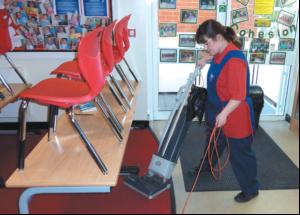 Upright vacuums clean up